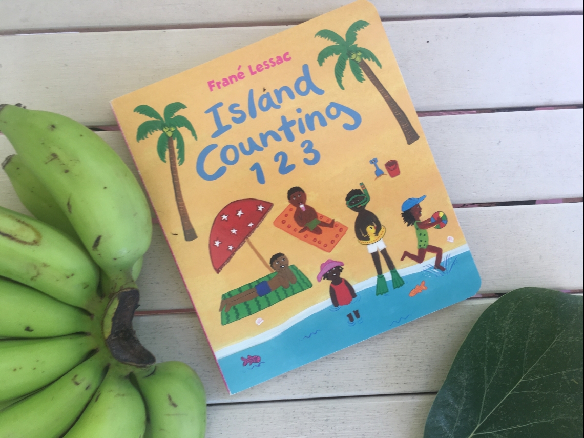 Board book titled Island Counting 1 2 3, with leaf and bananas